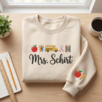 Personalized Teacher Name Apple School Bus Pencils Crayons Scissors Sleeve embroidered sweatshirt — front view