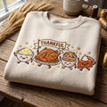 Thankful Thanksgiving Turkey Mashed Potato Stuffing Pie Kawaii Characters embroidered sweatshirt — front view
