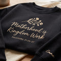 Personalized Motherhood Is Kingdom Work Proverbs 31 Floral Branch Faith Mom embroidered sweatshirt — front view
