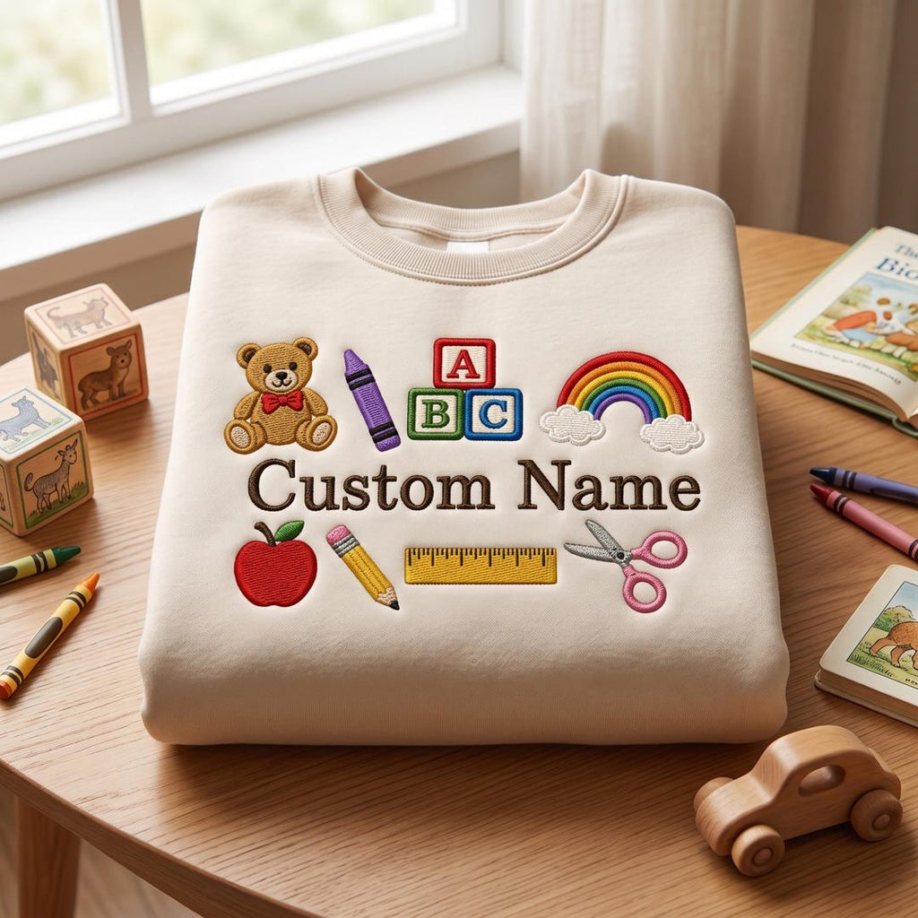 Personalized Preschool Kindergarten Abc Blocks Teddy Bear Rainbow Crayon Apple Ruler Scissors Custom Name embroidered sweatshirt — front view