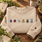 Six Garden Bugs Beetle Ladybug Dragonfly Sleeve Accent embroidered sweatshirt — front view