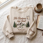 Personalized He Restores My Soul Psalm 23:3 Mountain Trees Butterfly Christian embroidered sweatshirt — front view
