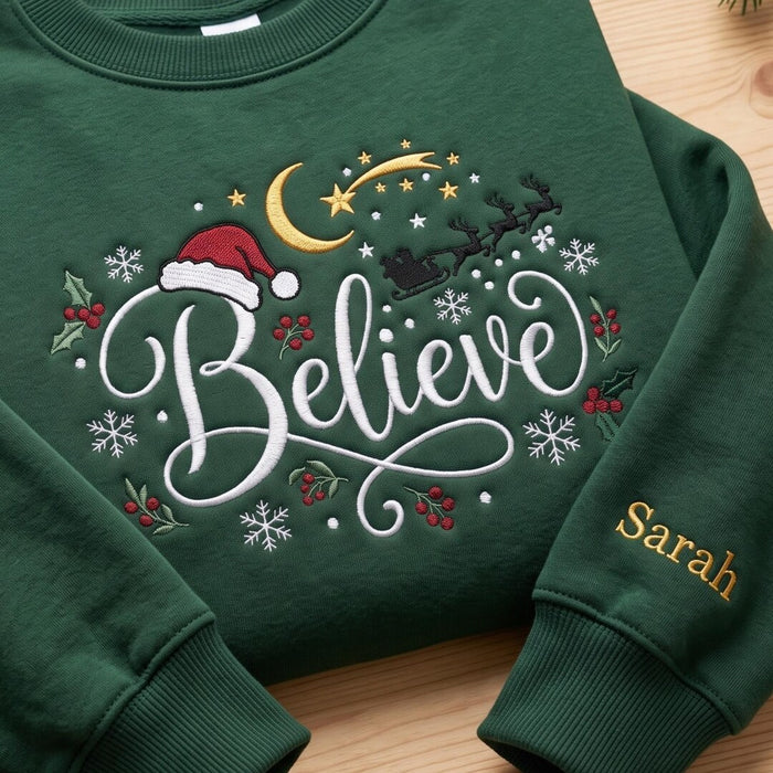 Personalized Believe Santa Hat Sleigh Reindeer Moon Holly Snowflakes Christmas Custom Name Sleeve Embroidered Sweatshirt