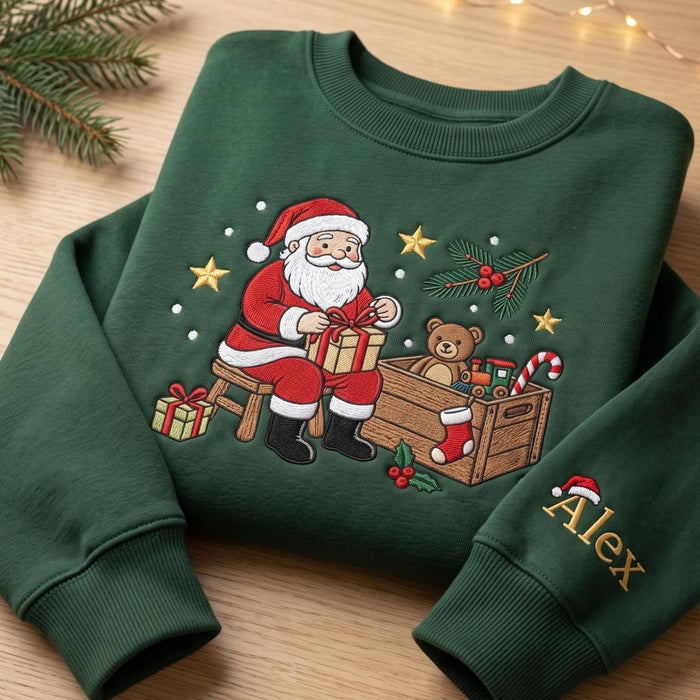 Personalized Santa Workshop Toy Box Teddy Bear Candy Cane Christmas Custom Name Sleeve Embroidered Sweatshirt