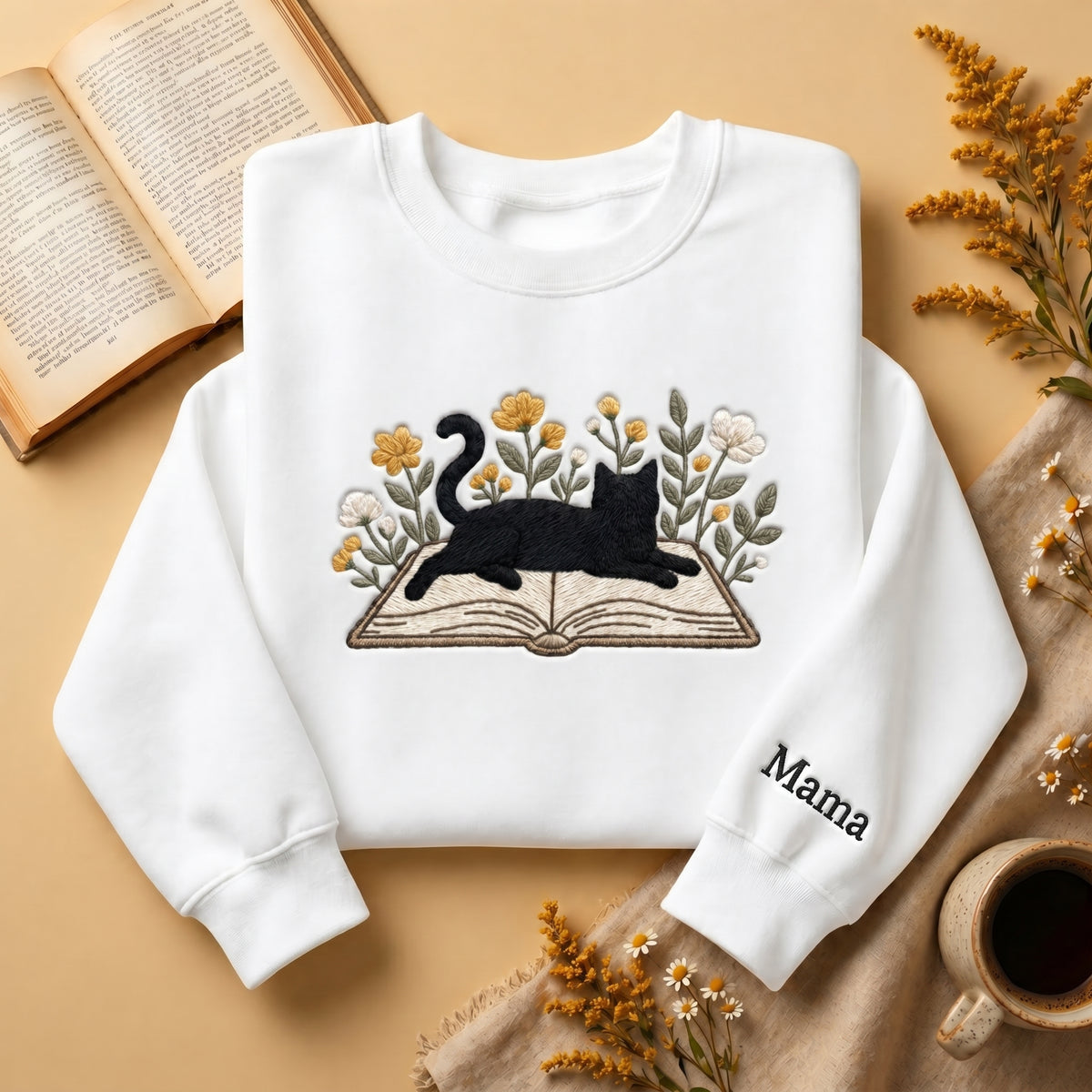 Personalized Cat Mom Black Cat Open Book Wildflowers embroidered sweatshirt — front view