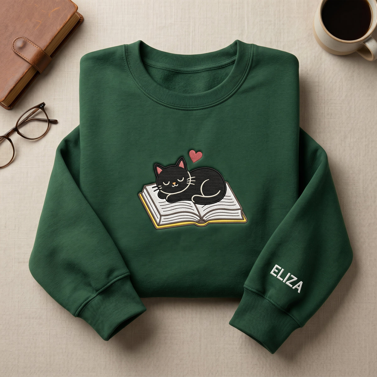 Personalized Black Cat Sleeping on Book Heart embroidered sweatshirt — front view