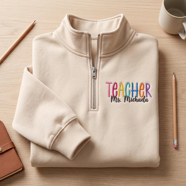 Personalized Teacher Name Colorful Rainbow Letters embroidered quarter-zip — front view