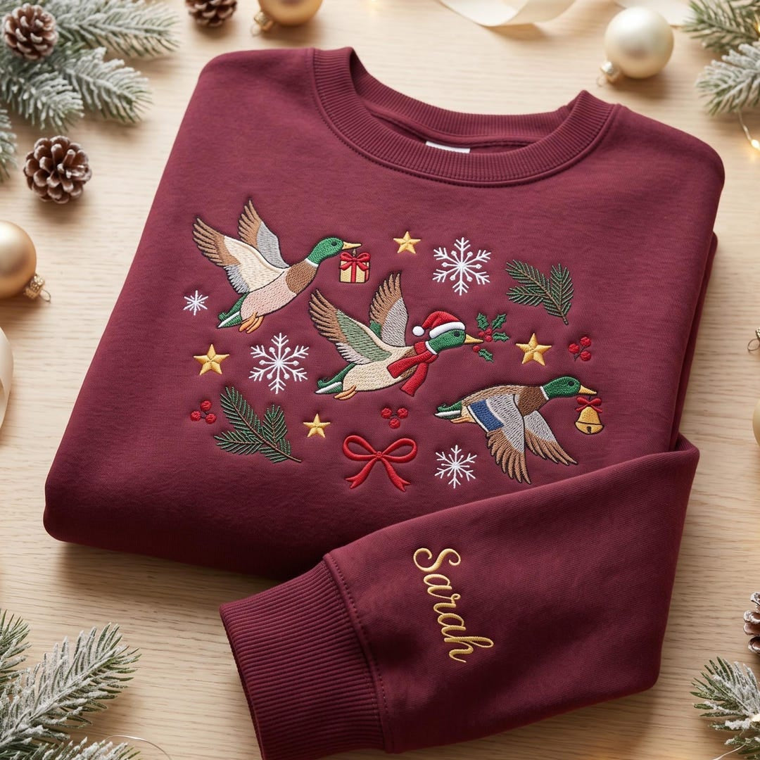 Personalized Christmas Flying Mallard Ducks Snowflakes Stars Festive Custom Name Sleeve embroidered sweatshirt — front view