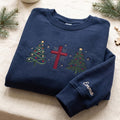 Personalized Christian Cross Christmas Trees Faith Holiday Custom Name Sleeve embroidered sweatshirt — front view