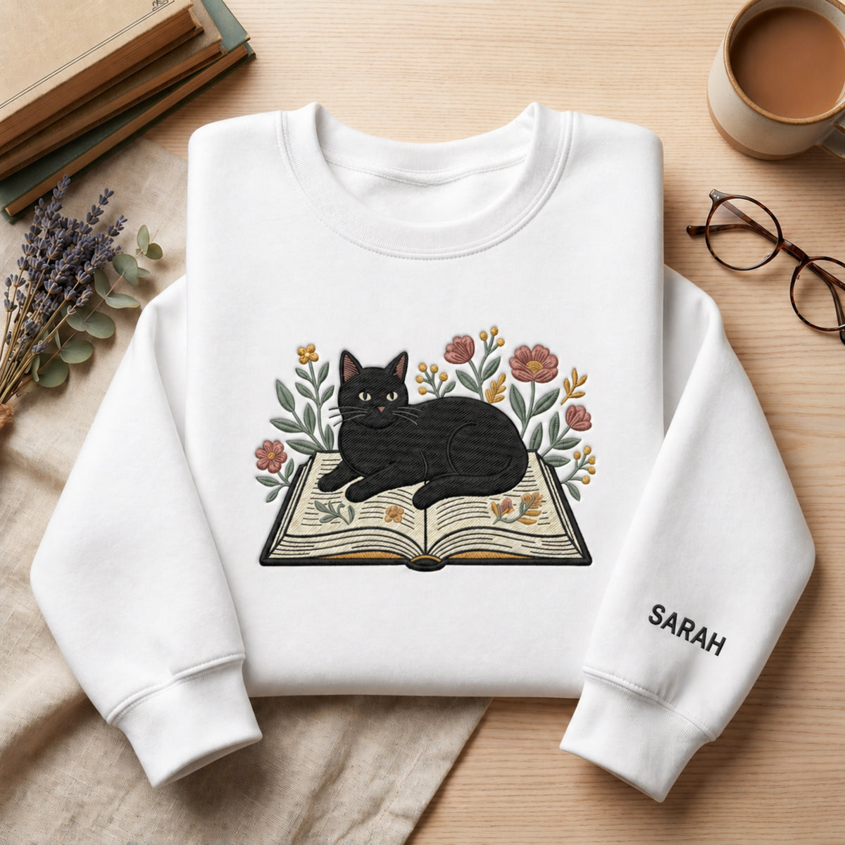 Personalized Black Cat Reading Book Wildflowers Custom Name embroidered sweatshirt — front view