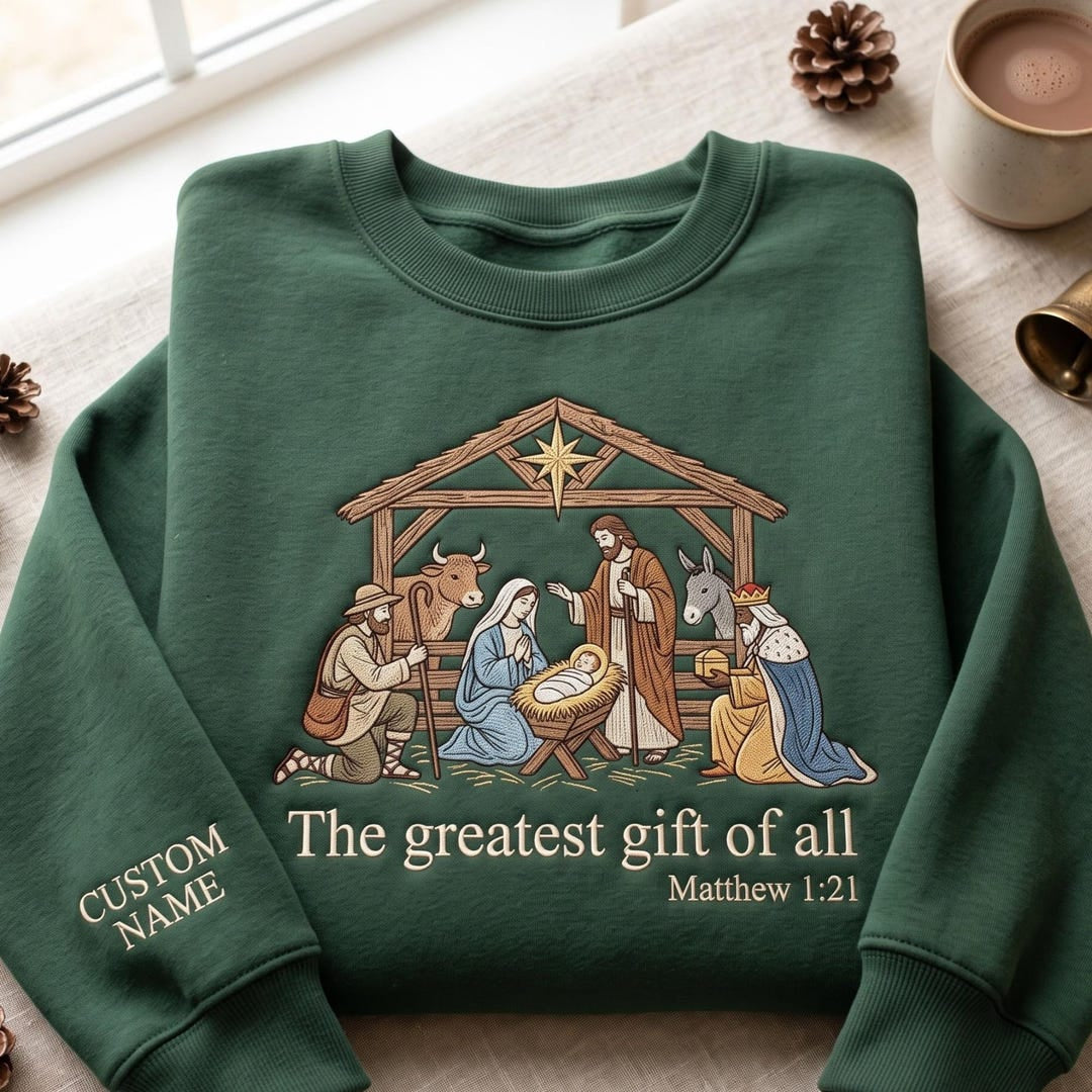 Personalized Nativity Scene the Greatest Gift of All Matthew 1:21 Custom Name Sleeve Christmas Faith embroidered sweatshirt — front view