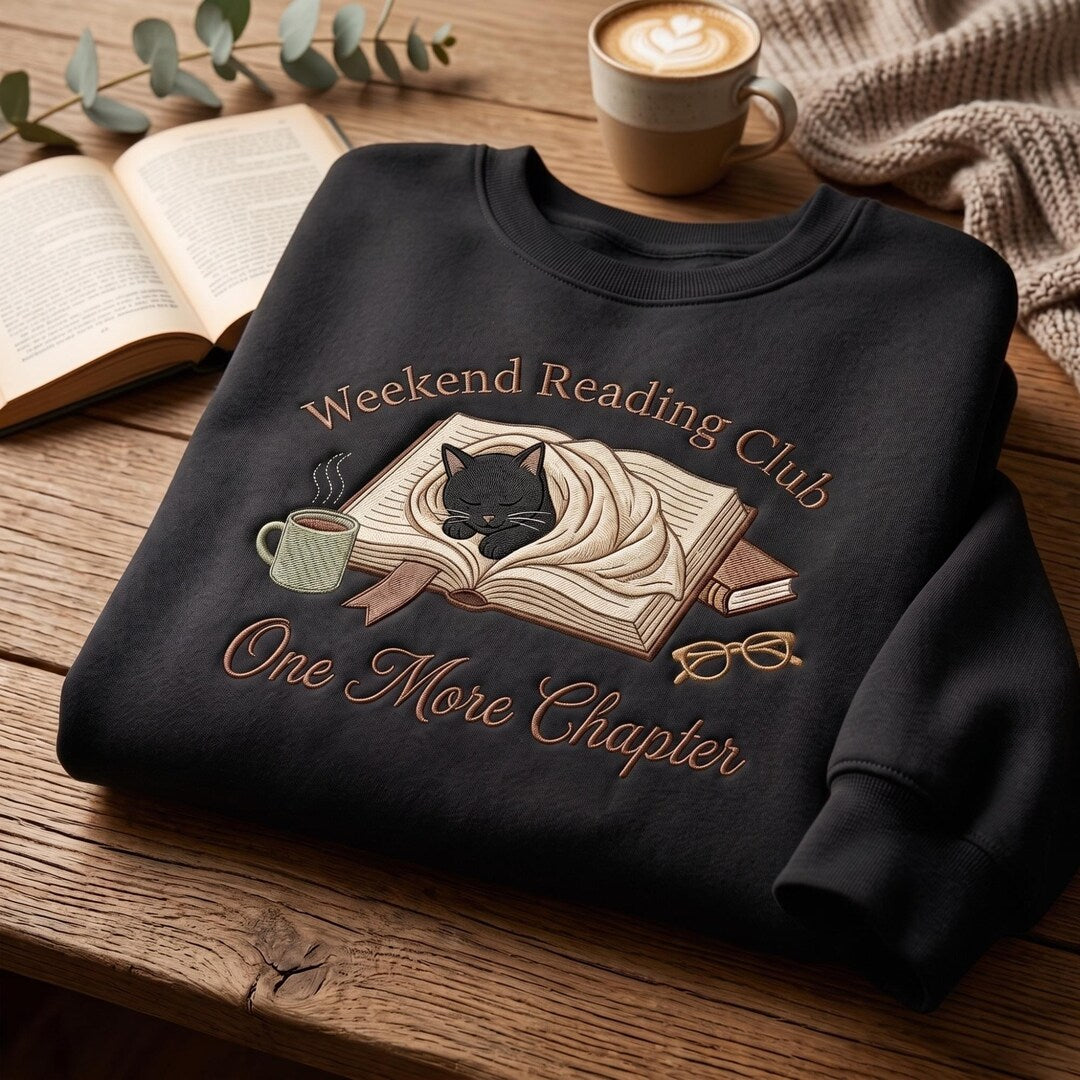 Weekend Reading Club Black Cat Sleeping Book Coffee Mug Glasses One More Chapter embroidered hoodie — front view