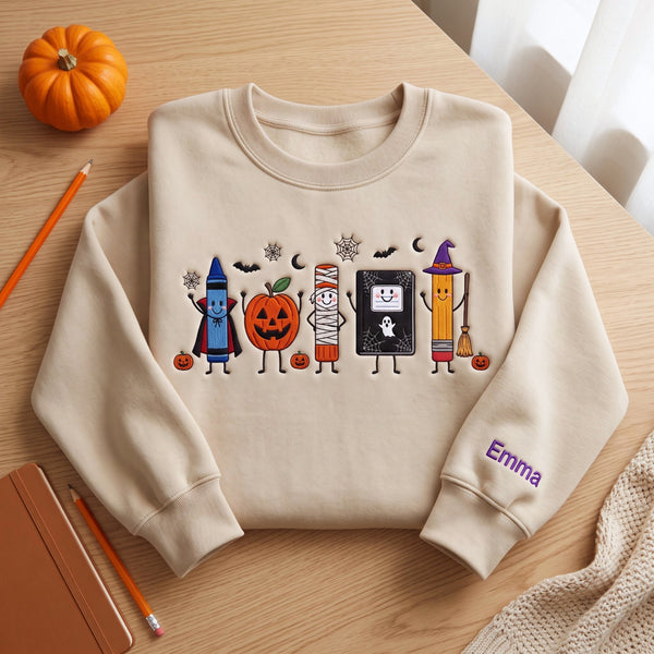 Personalized Halloween School Supplies Crayon Pumpkin Mummy Book Pencil Spooky embroidered sweatshirt — front view