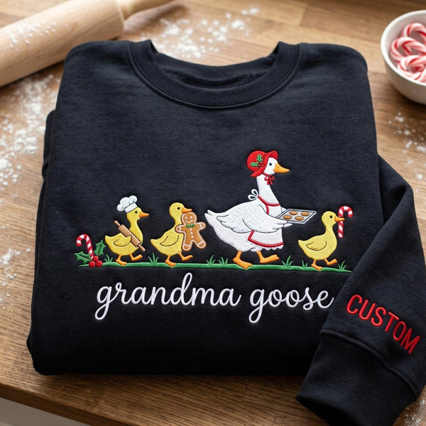 Personalized Grandma Goose Christmas Baking Goslings Custom Name EST Year embroidered sweatshirt — front view