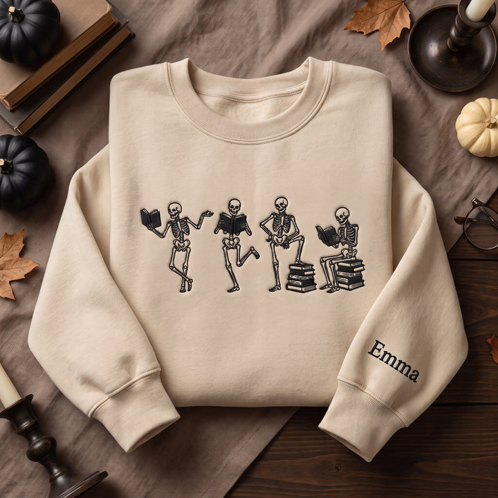 Personalized Halloween Skeleton Reading Books Sleeve Name embroidered sweatshirt — front view