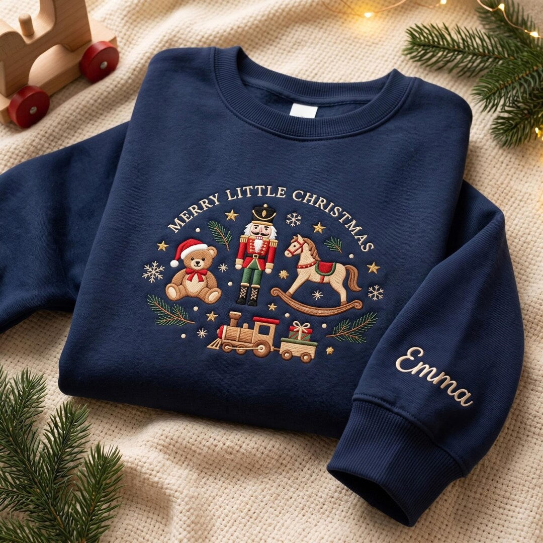 Personalized Merry Little Christmas Nutcracker Teddy Bear Rocking Horse Train Custom Name Sleeve embroidered sweatshirt — front view