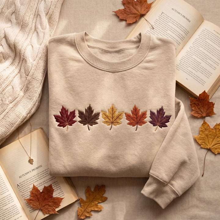 Five Autumn Maple Leaves Fall Colors Cozy embroidered sweatshirt — front view