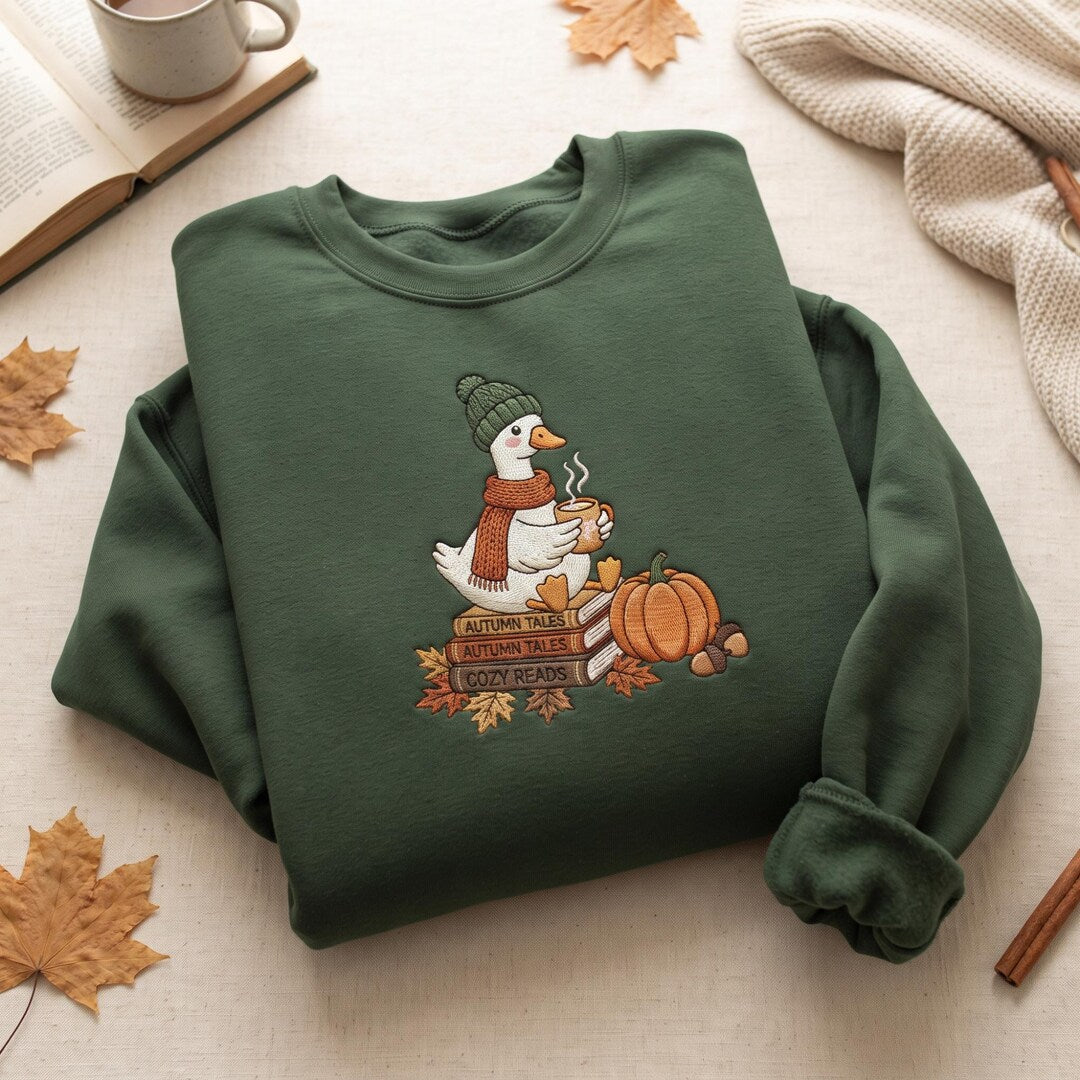 Personalized Autumn Goose Cozy Reading Books Pumpkin Fall Book Lover Custom Name embroidered sweatshirt — front view