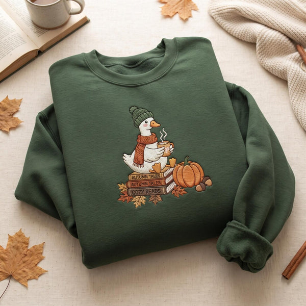 Personalized Autumn Goose Cozy Reading Books Pumpkin Fall Book Lover Custom Name embroidered sweatshirt — front view
