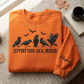 Personalized Halloween Murder of Crows Ravens Bats Support Your Local Murder Sleeve Name embroidered sweatshirt - front view