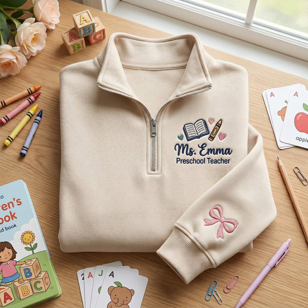 Personalized Preschool Teacher Book Crayon Bow Sleeve embroidered quarter-zip - front view