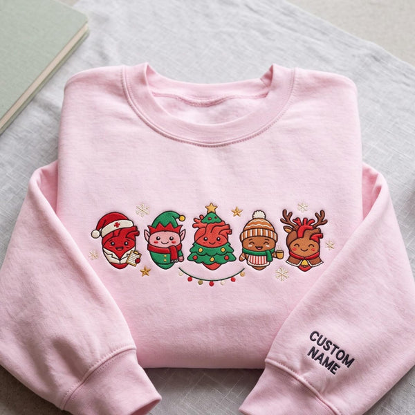 Personalized Christmas Nurse Cute Anatomical Heart Characters Holiday Custom Name Sleeve embroidered sweatshirt - front view