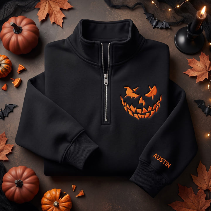 Personalized Halloween Jack-o-Lantern Face Sleeve Name embroidered quarter-zip - front view