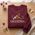 Personalized Grandma Wildflower Bouquet Butterflies Kids Names embroidered sweatshirt - front view