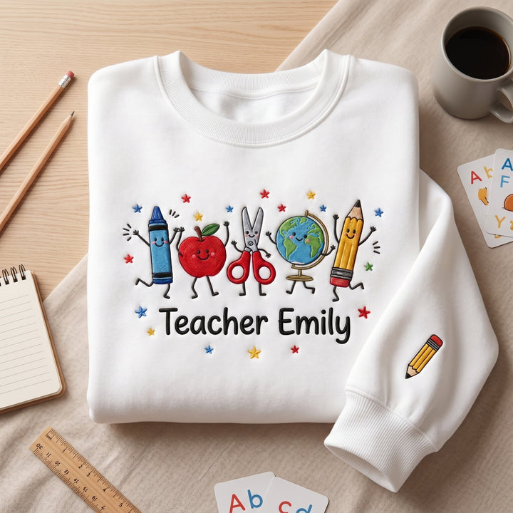 Personalized Teacher Name Crayon Apple Scissors Globe Pencil School Supplies embroidered sweatshirt - front view