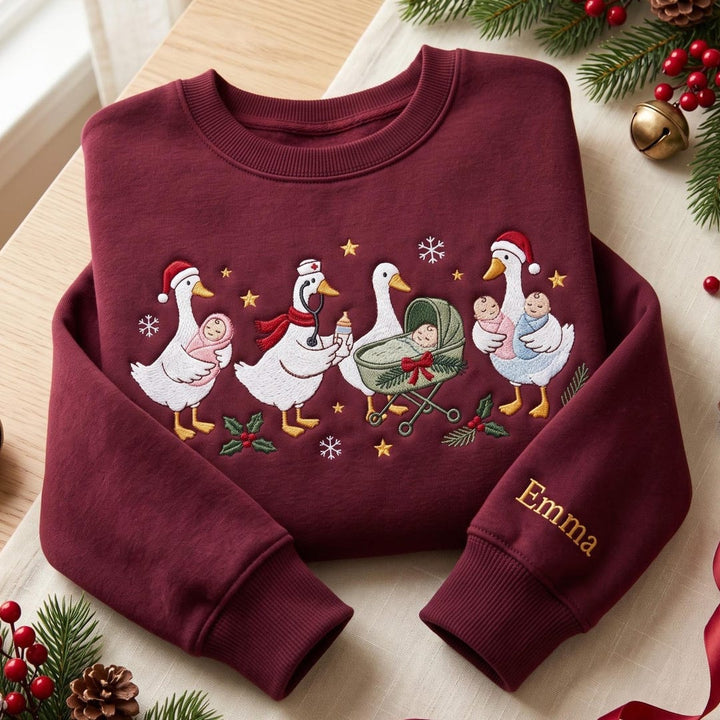 Personalized Christmas Nurse Goose Baby Stroller Santa Hat Snowflakes Holly Custom Name Sleeve embroidered sweatshirt - front view