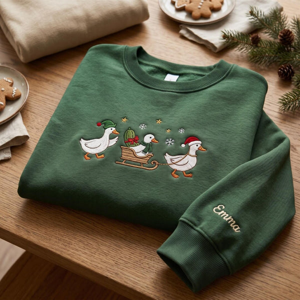 Personalized Christmas Goose Sleigh Elf Santa Hat Snowflakes Custom Name Sleeve embroidered sweatshirt - front view