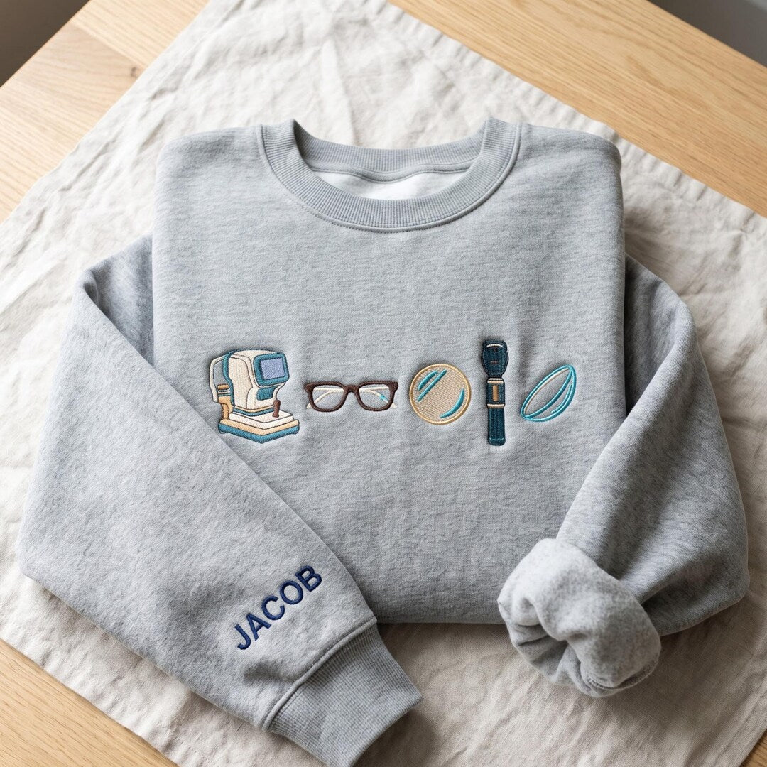 Personalized Optometrist Eye Doctor Glasses Autorefractor Ophthalmoscope Contact Lens embroidered sweatshirt - front view