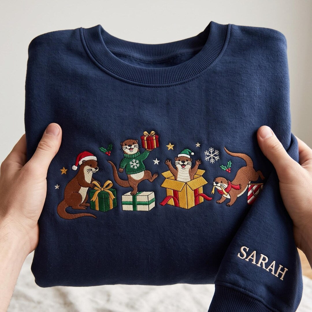 Personalized Christmas Four Otters Holiday Scene Custom Name Sleeve embroidered sweatshirt - front view