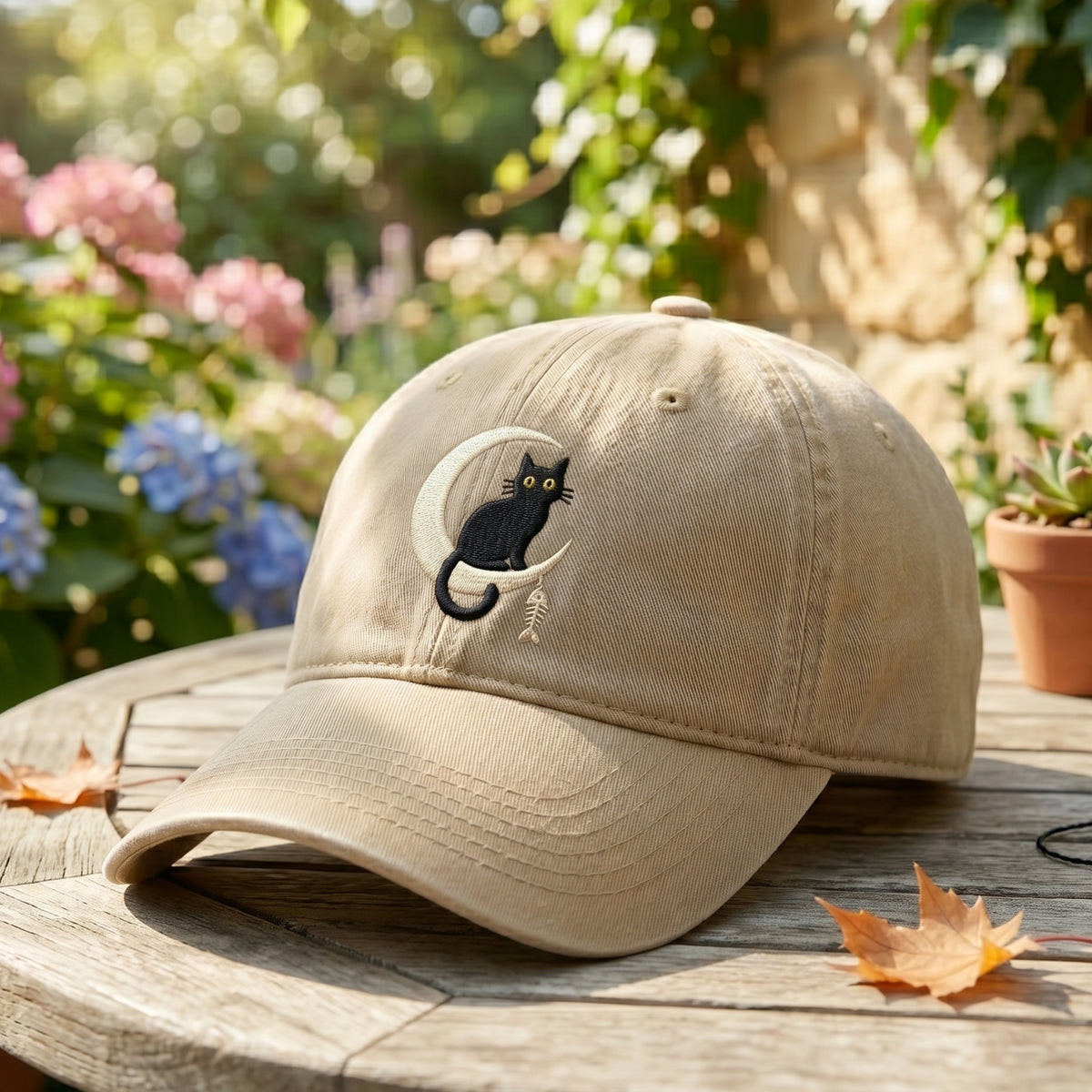 Black Cat Crescent Moon Fish Bone embroidered hat — front view