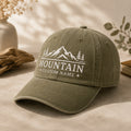 Mountain Range Pine Custom Name Line Art embroidered hat in Amy Green — front view