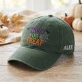 Personalized Trick or Treat Spider Webs embroidered hat in Amy Green — front view