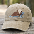 Sea Otter Holding Fish Water Ripple Embroidered Hat — Washed Hat