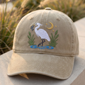 Great Egret Catching Fish Crescent Moon Stars Marsh Reeds Embroidered Hat — Washed Hat