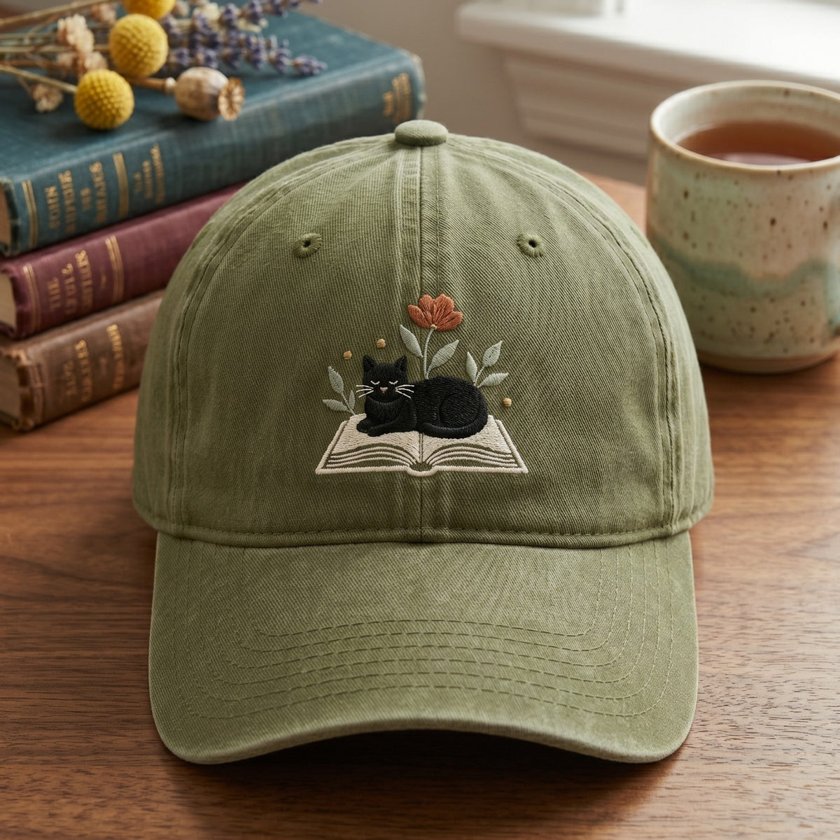 Black Cat Sleeping on Open Book Wildflowers Embroidered Hat — Washed Hat