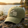 Reel Cool Dad Fishing Bass Fish Embroidered Hat — Washed Hat
