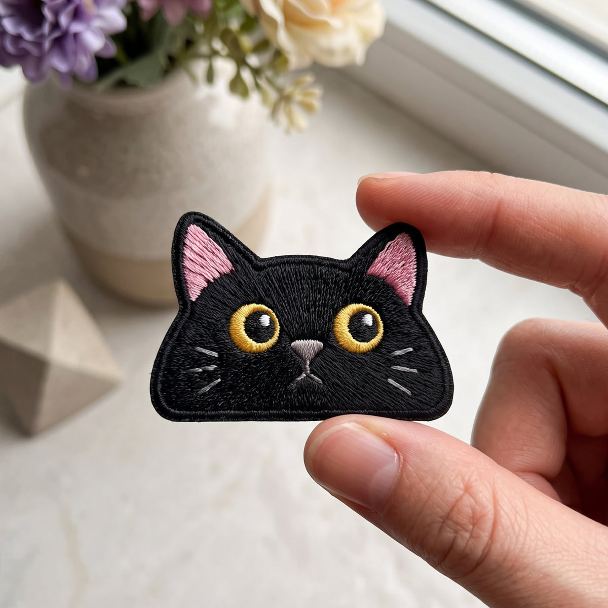 Black Cat Peeking Face embroidered patch in 3" — front view