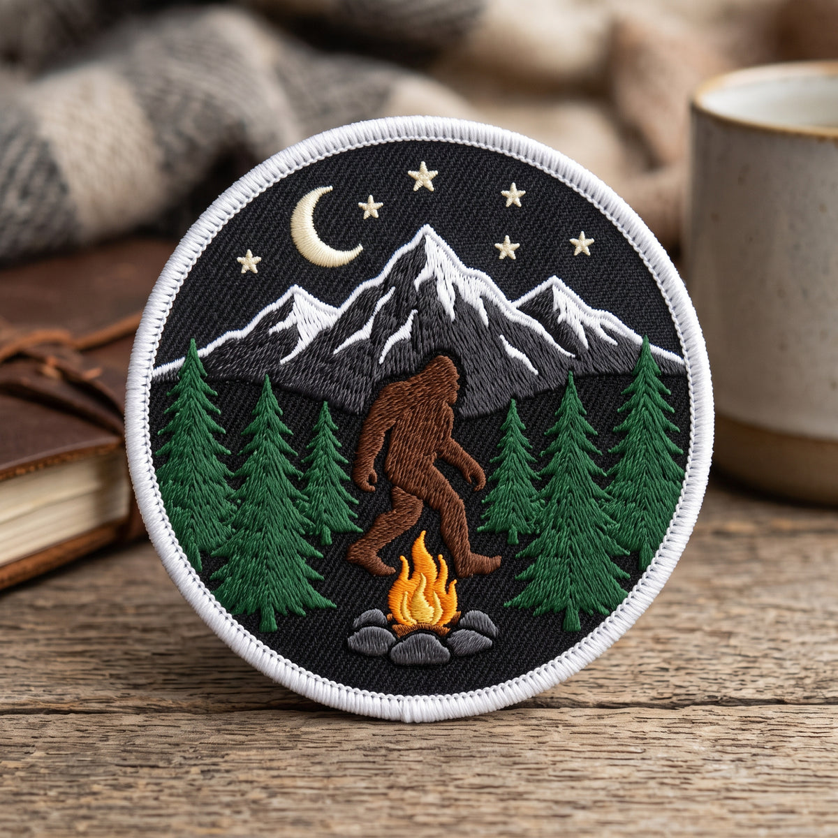 Bigfoot Campfire Mountain Forest embroidered patch in 3" — front view