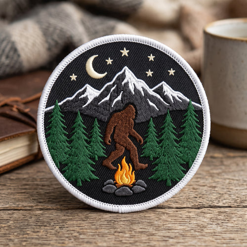 Bigfoot Campfire Mountain Forest embroidered patch in 3" — front view