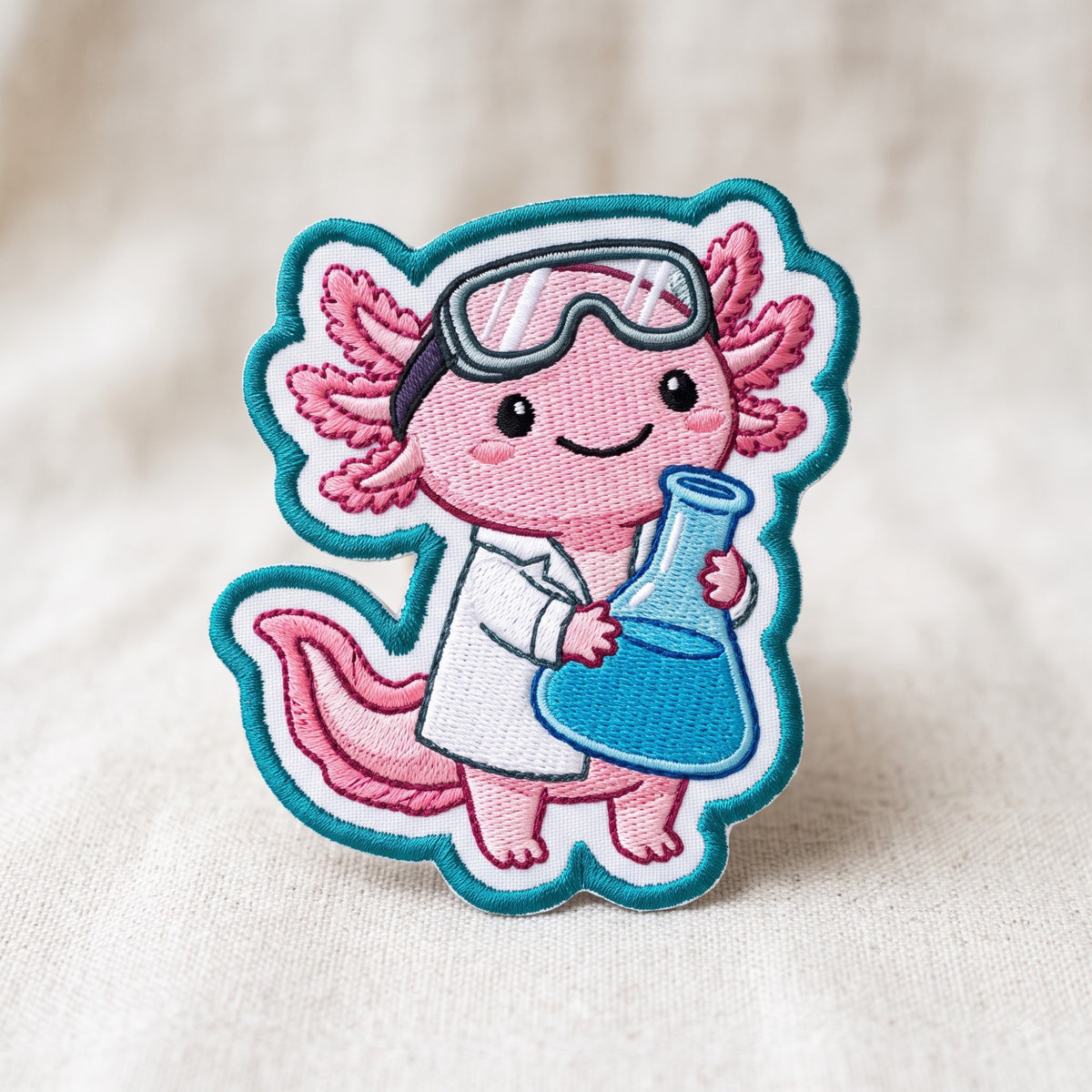 Axolotl Scientist Lab Coat Flask embroidered patch in 3" — front view