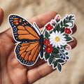 Monarch Butterfly Wildflowers embroidered patch in 3" — front view