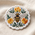 Honey Bee Wildflower Wreath embroidered patch in 3" — front view