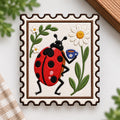 Ladybug Holding Coffee Cup Daisy Flower Garden Stamp Iron On Embroidered Patch — Iron-on patch