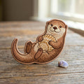 Sea Otter Holding Seashell Iron On Embroidered Patch — Iron-on patch