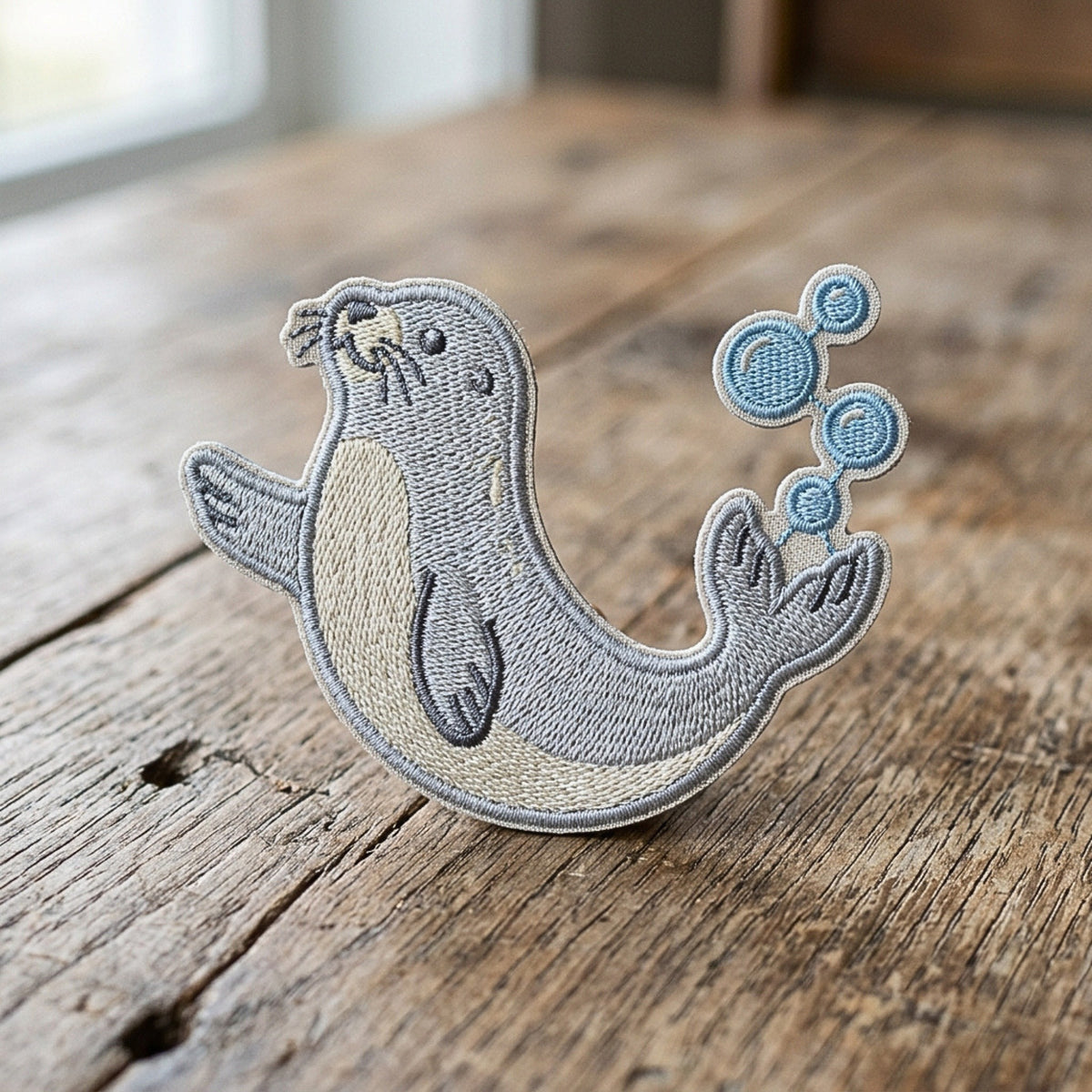 Cute Seal Blowing Bubbles Iron On Embroidered Patch — Iron-on patch