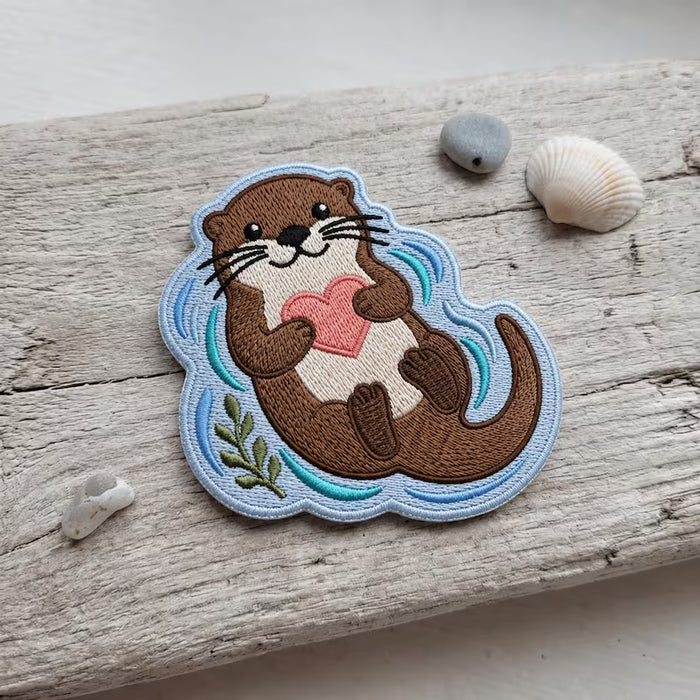 Sea Otter Holding Heart Floating Water Plants Iron On Embroidered Patch